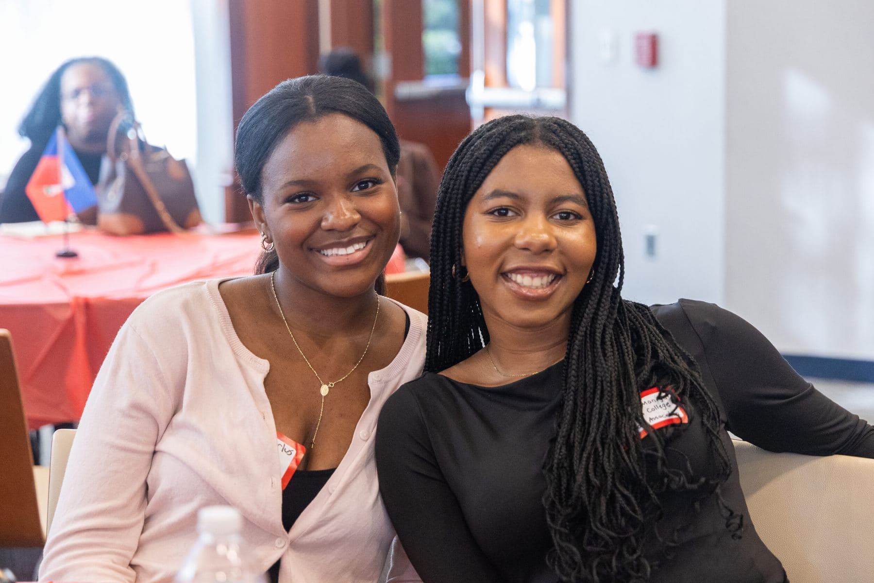 Two students smiling at the 2025 Forum