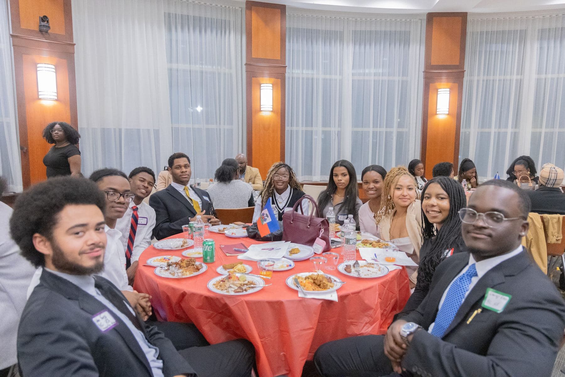 Students seated around tables at the 2025 Forum